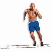 Beachbody Agility Ladder in use by shirtless fit man.  